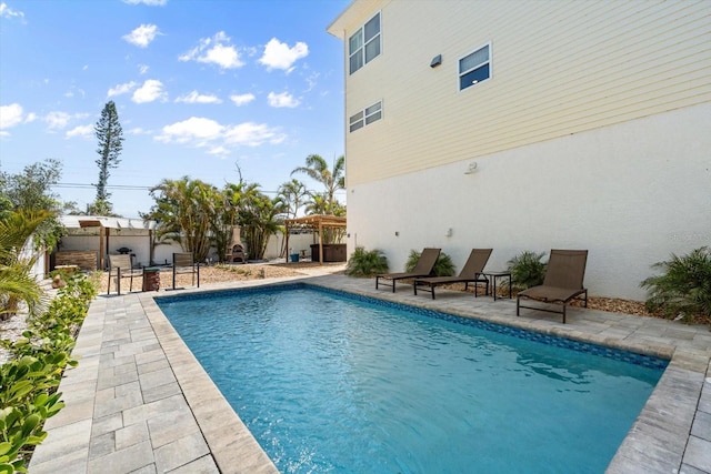 4717 Lemon Bay Dr, Venice, FL 34293 - view of pool featuring a fenced in pool, a patio, a fenced backyard, and a pergola