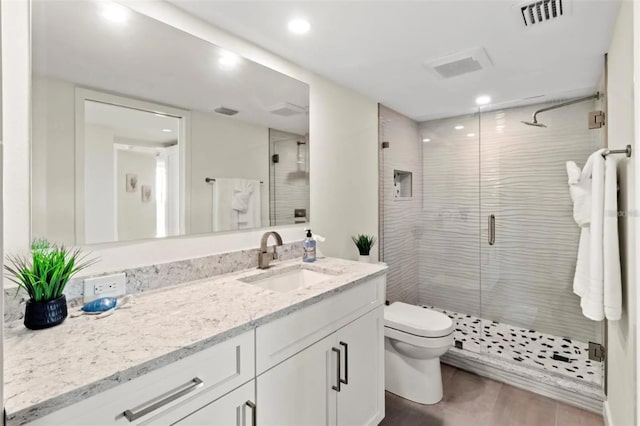 full bathroom with visible vents, vanity, toilet, recessed lighting, and a stall shower