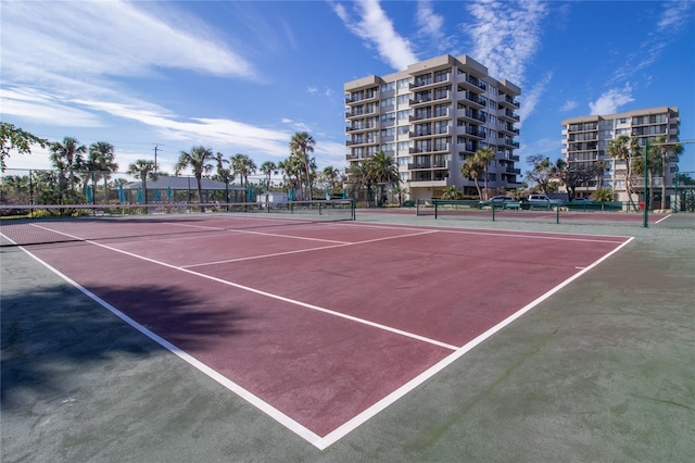 view of sport court with fence and community basketball court