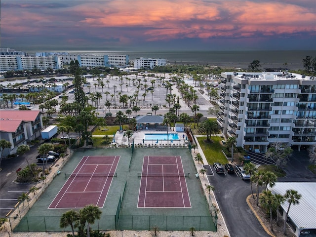 aerial view at dusk with a water view
