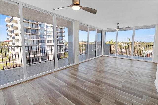 unfurnished sunroom with a healthy amount of sunlight