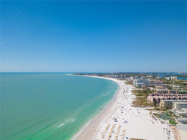 aerial view featuring a water view and a beach view