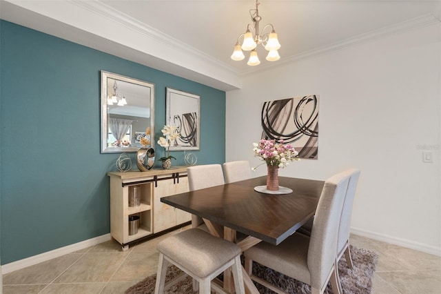 dining area featuring a chandelier, light tile patterned floors, ornamental molding, and baseboards