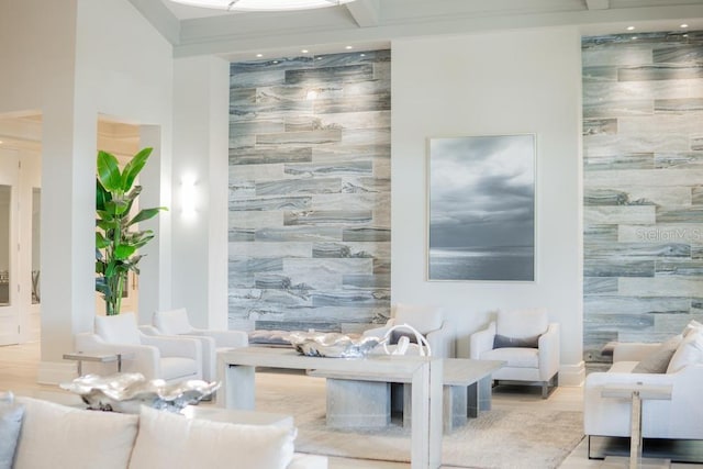 lobby with tile walls and recessed lighting