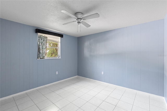 1802 Robinhood St, Sarasota, FL 34231 - empty room with a textured ceiling and ceiling fan