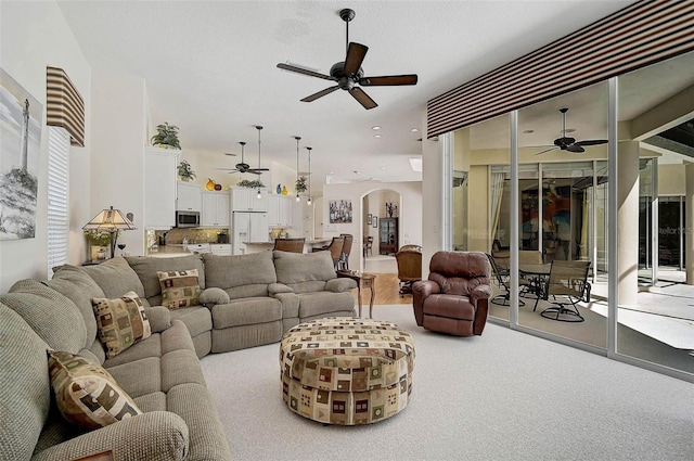 2111 Muskogee Trl, Nokomis, FL 34275 - living room featuring recessed lighting, arched walkways, carpet, and ceiling fan