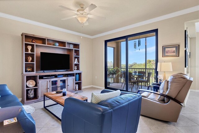 tiled living room with a ceiling fan, baseboards, and ornamental molding