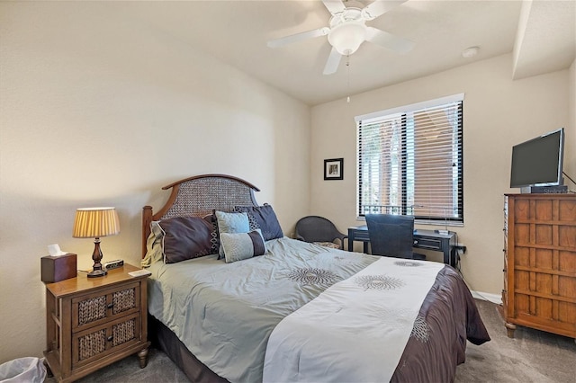 bedroom with baseboards, a ceiling fan, and carpet floors