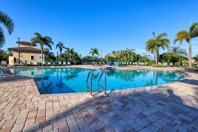 community pool with a patio