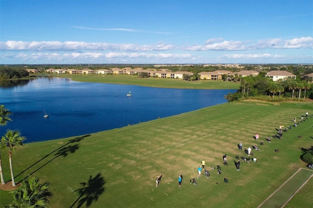 birds eye view of property featuring a water view