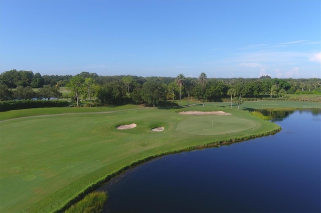 view of property's community with a water view and golf course view