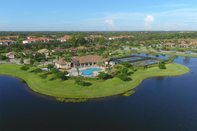 drone / aerial view featuring a water view and a residential view