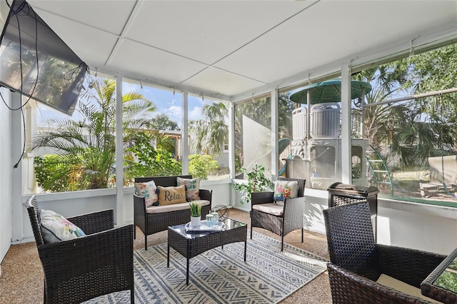 sunroom / solarium featuring an outdoor living space