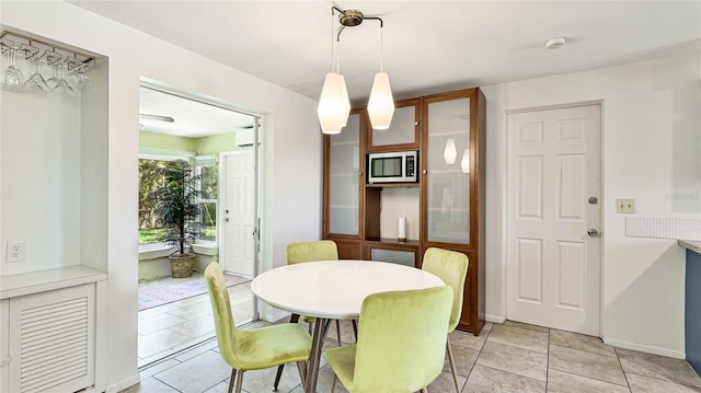 6529 Seagate Ave, Sarasota, FL 34231 - dining area featuring baseboards