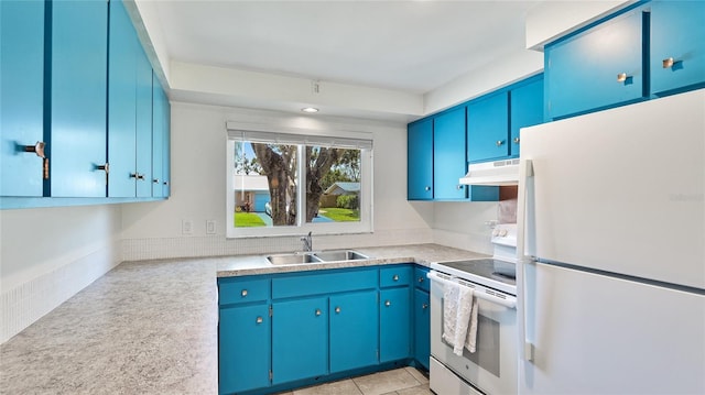 6529 Seagate Ave, Sarasota, FL 34231 - kitchen featuring white appliances, under cabinet range hood, a sink, light countertops, and blue cabinets