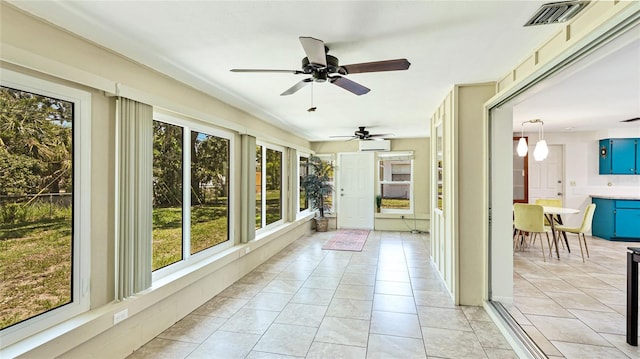 6529 Seagate Ave, Sarasota, FL 34231 - unfurnished sunroom with a wall mounted AC