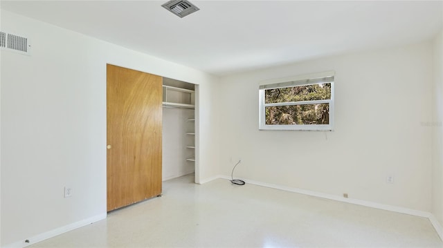 6529 Seagate Ave, Sarasota, FL 34231 - unfurnished bedroom featuring a closet and baseboards