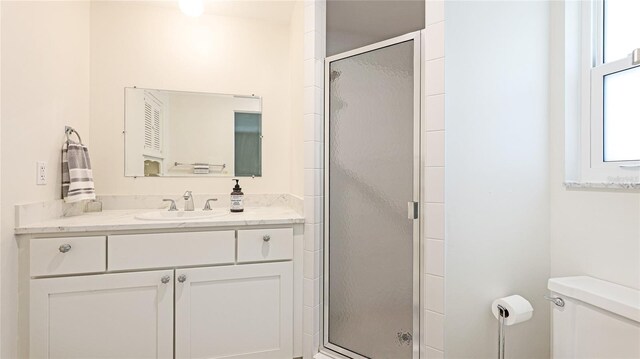 6529 Seagate Ave, Sarasota, FL 34231 - full bathroom featuring a shower stall, toilet, and vanity