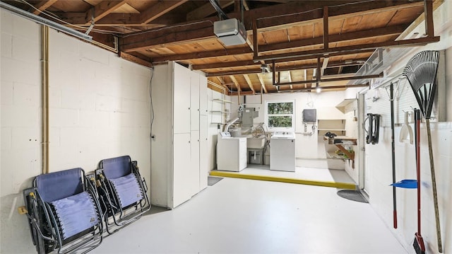 6529 Seagate Ave, Sarasota, FL 34231 - below grade area with washer / dryer, electric panel, and concrete block wall