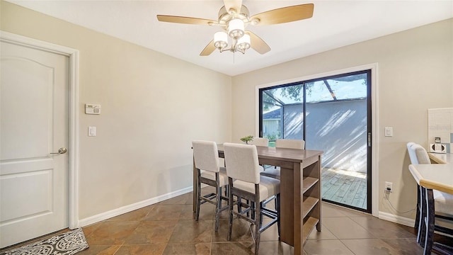 3761 Countryside Rd, Sarasota, FL 34233 - dining area with baseboards and ceiling fan