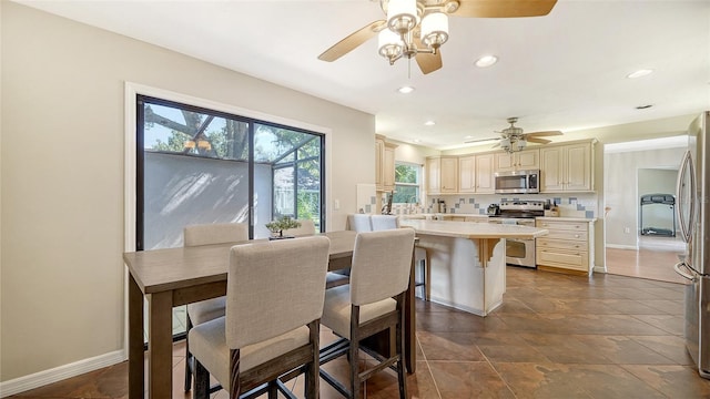 3761 Countryside Rd, Sarasota, FL 34233 - dining space featuring baseboards, a ceiling fan, and recessed lighting
