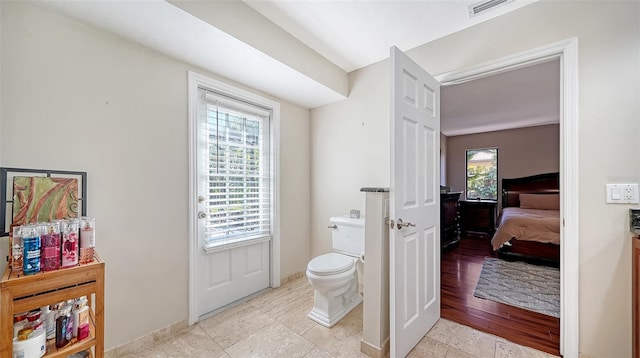 3761 Countryside Rd, Sarasota, FL 34233 - ensuite bathroom with toilet, visible vents, and ensuite bath