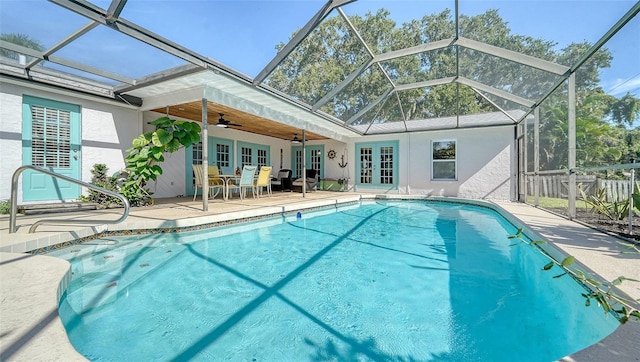 3761 Countryside Rd, Sarasota, FL 34233 - pool with a ceiling fan, a patio area, a lanai, and french doors
