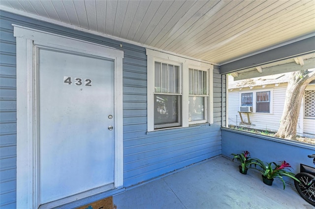 432 Adelia Ave, Sarasota, FL 34236 - doorway to property featuring cooling unit