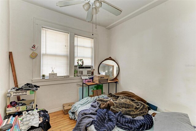 432 Adelia Ave, Sarasota, FL 34236 - bedroom with baseboards, ceiling fan, and wood finished floors