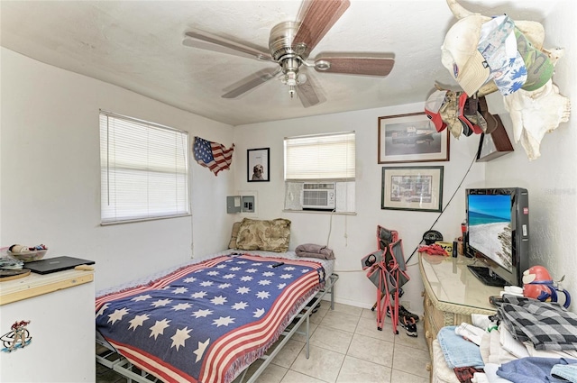 432 Adelia Ave, Sarasota, FL 34236 - bedroom with a ceiling fan, light tile patterned floors, and cooling unit