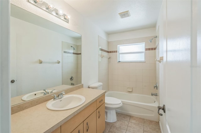 full bath with vanity, toilet, tile patterned floors,  shower combination, and visible vents