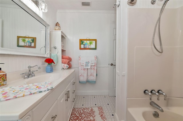 1722 Hazelwood St, Sarasota, FL 34231 - full bathroom with shower / washtub combination, vanity, tile patterned flooring, and baseboards