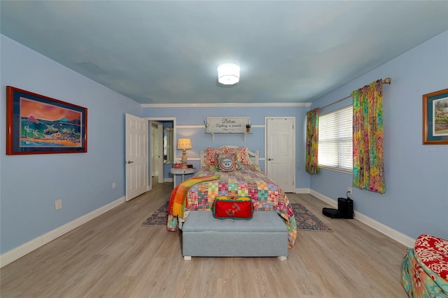 1722 Hazelwood St, Sarasota, FL 34231 - bedroom with wood finished floors and baseboards