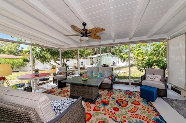 1722 Hazelwood St, Sarasota, FL 34231 - sunroom with an outdoor hangout area, a ceiling fan, beamed ceiling, and healthy amount of natural light
