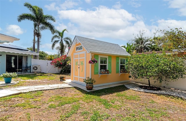 1722 Hazelwood St, Sarasota, FL 34231 - view of outdoor structure featuring ac unit