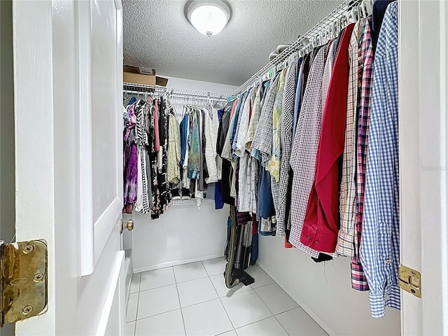 walk in closet featuring tile patterned floors