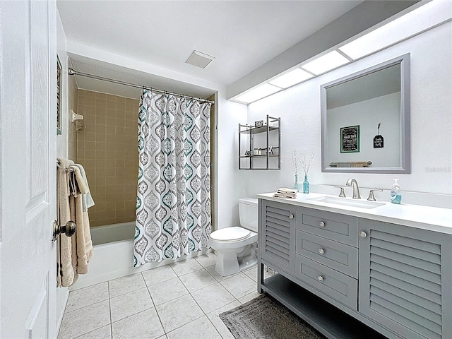 full bathroom with toilet, vanity, visible vents, shower / bath combo, and tile patterned flooring