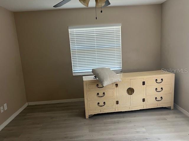 6383 N Jade Ter, Crystal River, FL 34428 - bedroom with light wood-style floors, baseboards, and ceiling fan