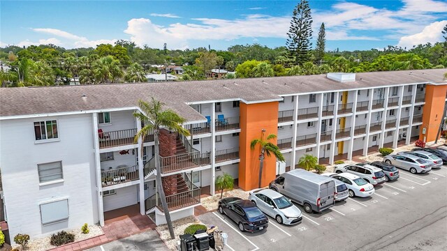 2321 Canal Dr Unit F25, Bradenton, FL 34207 - view of apartment building / complex featuring uncovered parking