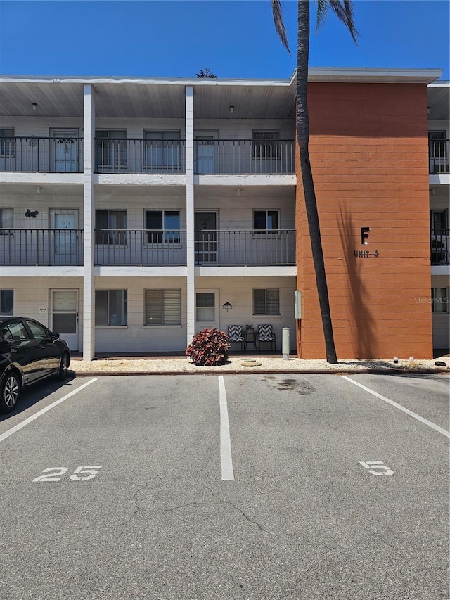2321 Canal Dr Unit F25, Bradenton, FL 34207 - view of property featuring uncovered parking