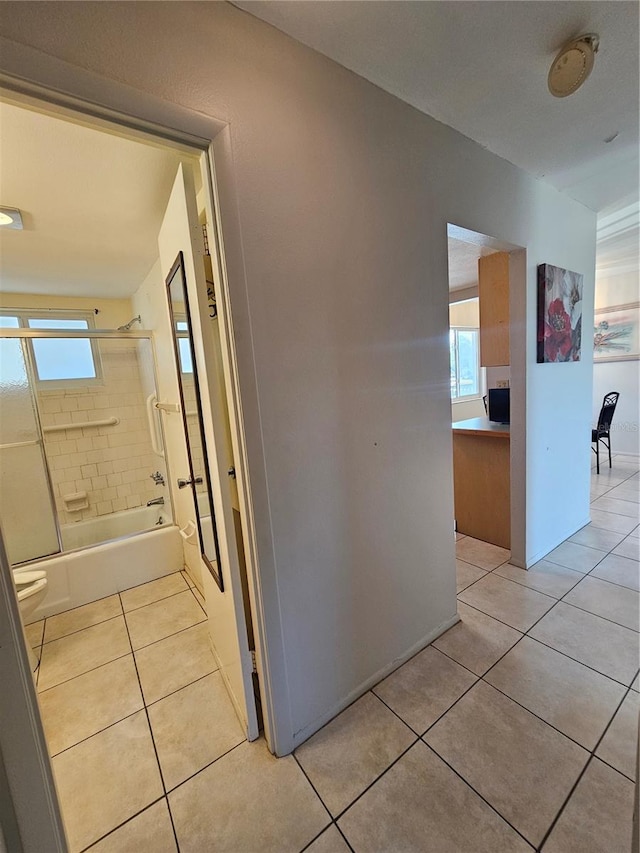 2321 Canal Dr Unit F25, Bradenton, FL 34207 - hallway featuring light tile patterned floors