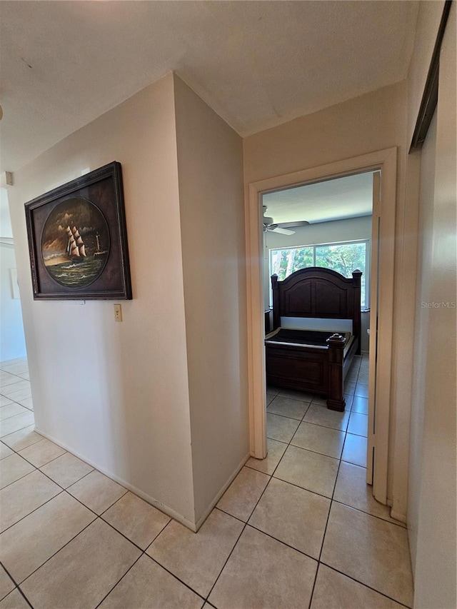 2321 Canal Dr Unit F25, Bradenton, FL 34207 - hallway featuring light tile patterned flooring