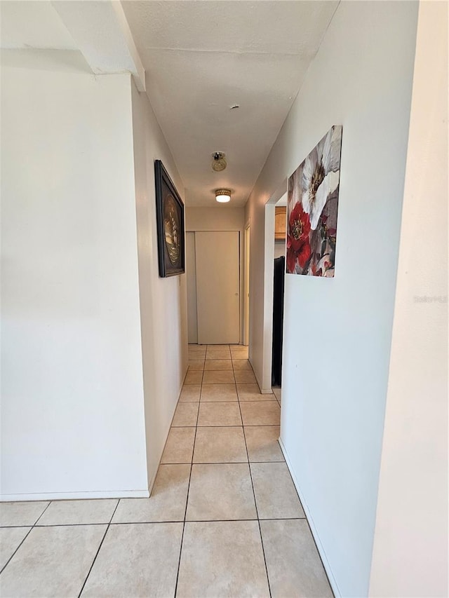 2321 Canal Dr Unit F25, Bradenton, FL 34207 - corridor with light tile patterned flooring