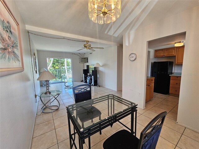 2321 Canal Dr Unit F25, Bradenton, FL 34207 - living room with light tile patterned flooring, a chandelier, a ceiling fan, an AC wall unit, and vaulted ceiling