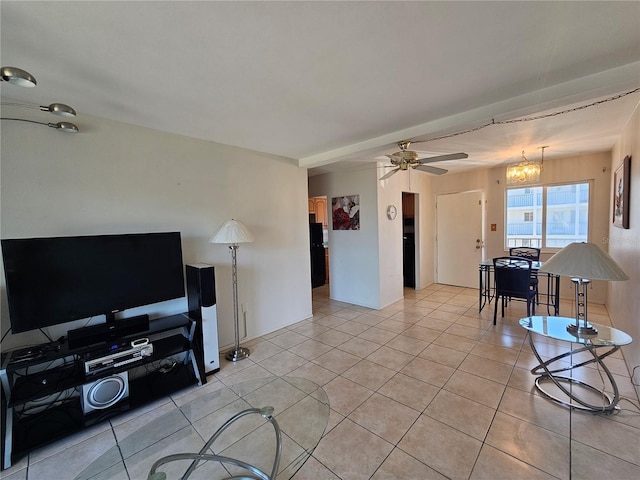 2321 Canal Dr Unit F25, Bradenton, FL 34207 - living room featuring light tile patterned flooring, ceiling fan, and a chandelier