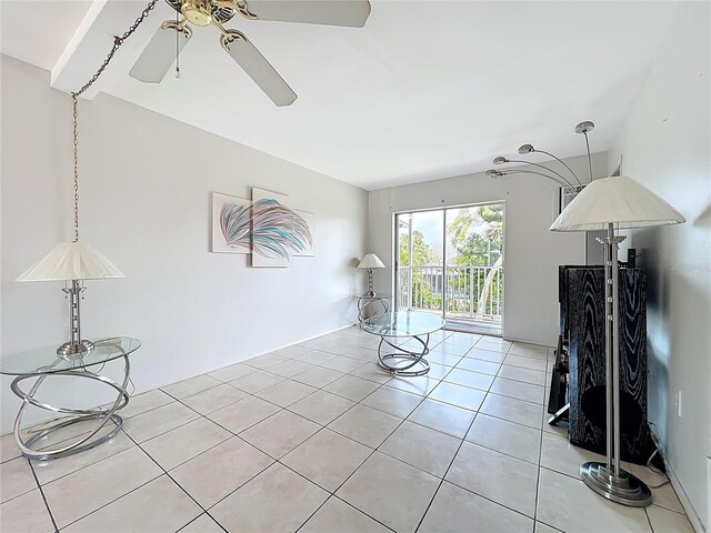 2321 Canal Dr Unit F25, Bradenton, FL 34207 - unfurnished living room with a ceiling fan and light tile patterned floors