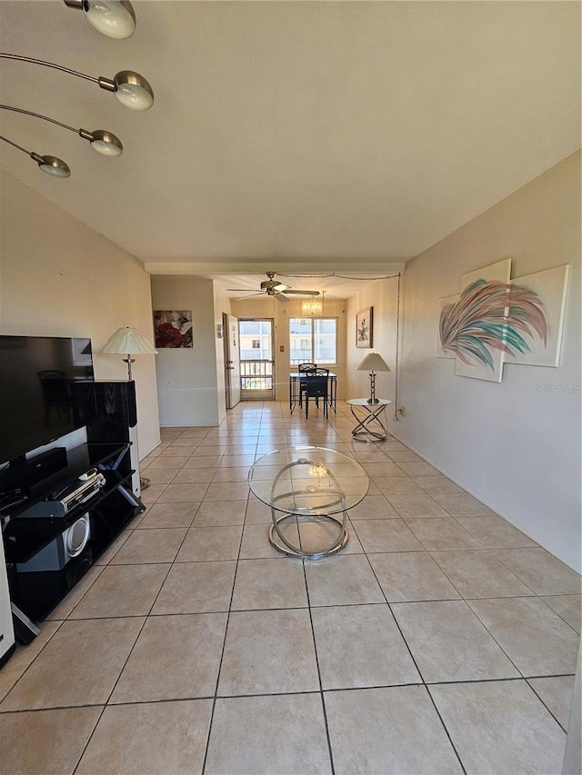 2321 Canal Dr Unit F25, Bradenton, FL 34207 - living area with a ceiling fan and light tile patterned floors