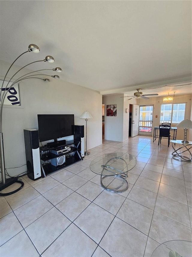 2321 Canal Dr Unit F25, Bradenton, FL 34207 - living room with light tile patterned floors and ceiling fan
