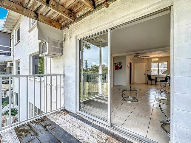 2321 Canal Dr Unit F25, Bradenton, FL 34207 - doorway to property featuring a ceiling fan and a balcony