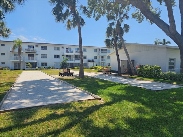 2321 Canal Dr Unit F25, Bradenton, FL 34207 - view of home's community with a lawn